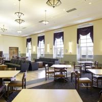 Bard Hall with empty tables and chairs.